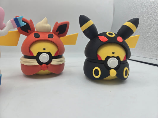 Pikachu Poncho Eeveelution Pokeball Clicker Fidget or Display 3D print shown as a pair or set
