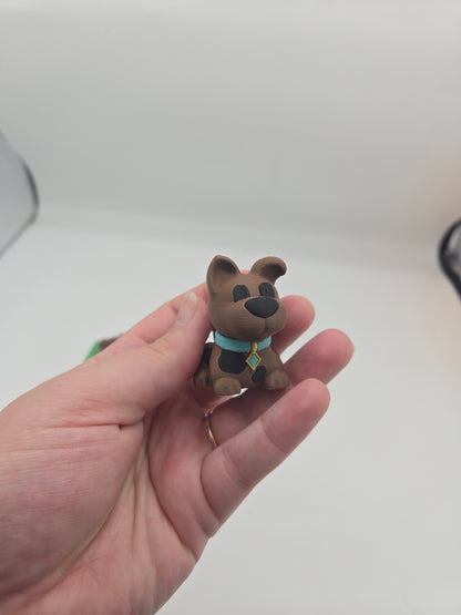 Mini Scooby Doo inspired dog figurine 3D print held in hand for size reference