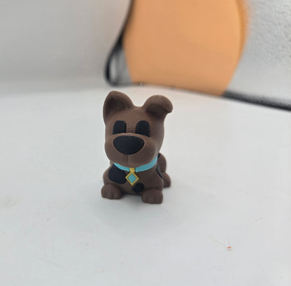 Mini Scooby Doo inspired dog figurine 3D print close-up showing teal collar with diamond tag and black spots