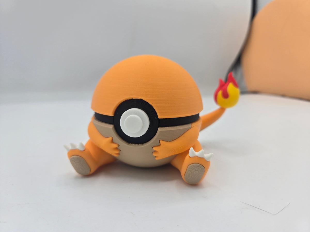 Pokémon Pokéball Inspired Clickers 3D print — Charmander style clicker, orange shell with cream belly, clawed feet and flame-tipped tail