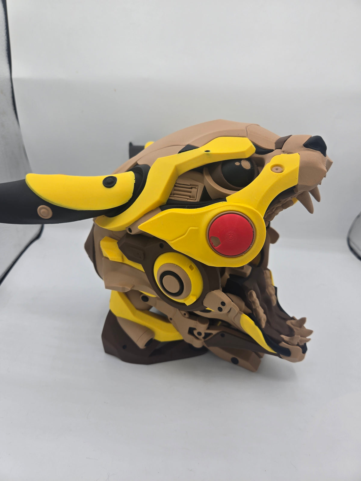 Mekachu Mecha Monster controller holder 3D print right side profile with jaw open showing layered yellow and tan mecha armor and articulated lower jaw