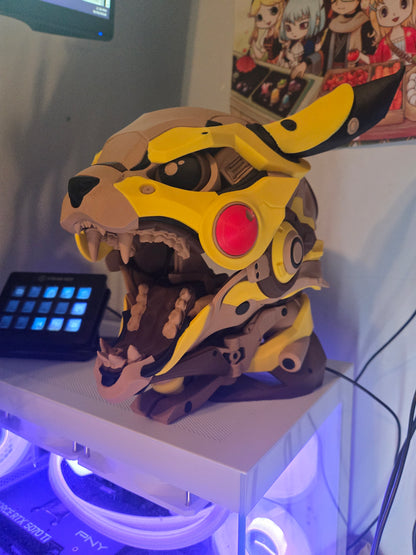 Mekachu Mecha Monster controller holder 3D print on a gaming PC desk beside a stream deck with purple LED lighting, jaw open, front-left view