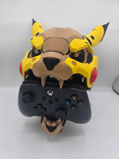 Mekachu Mecha Monster controller holder 3D print front view holding a black Xbox controller in its open jaw beneath the armored face
