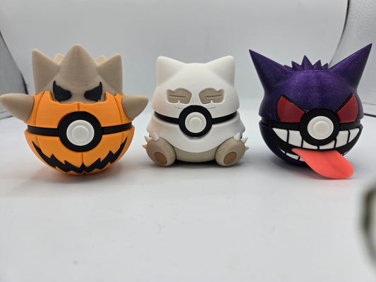 Pokémon Pokéball Inspired Clickers 3D print Halloween Trio: orange jack-o'-lantern Pumpkin Togepi, white ghostly Spooky Snorlax and purple Gengar with pink tongue, each with a white clicker button