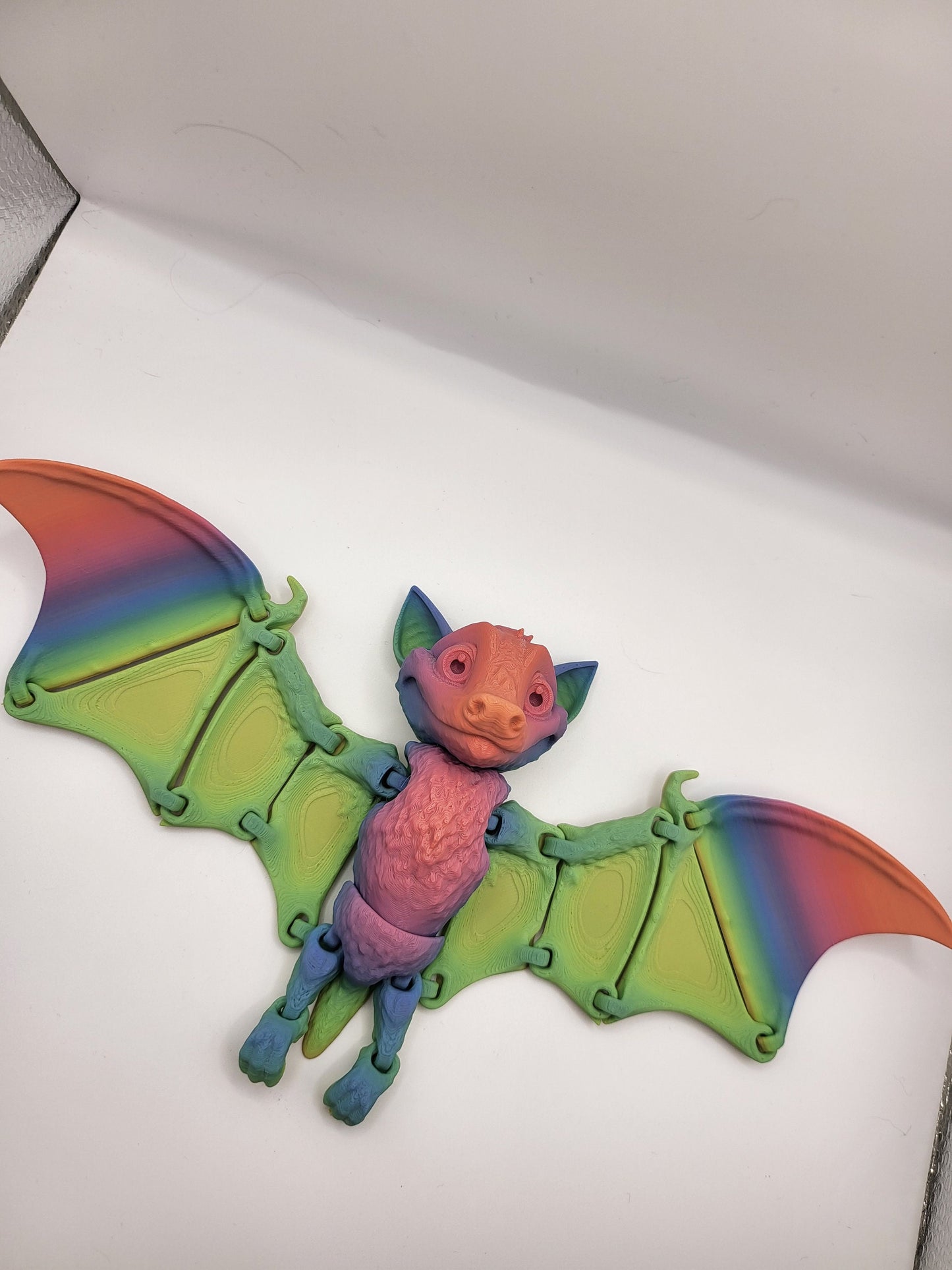 Fruit bat 3D print side view showing articulated wing span