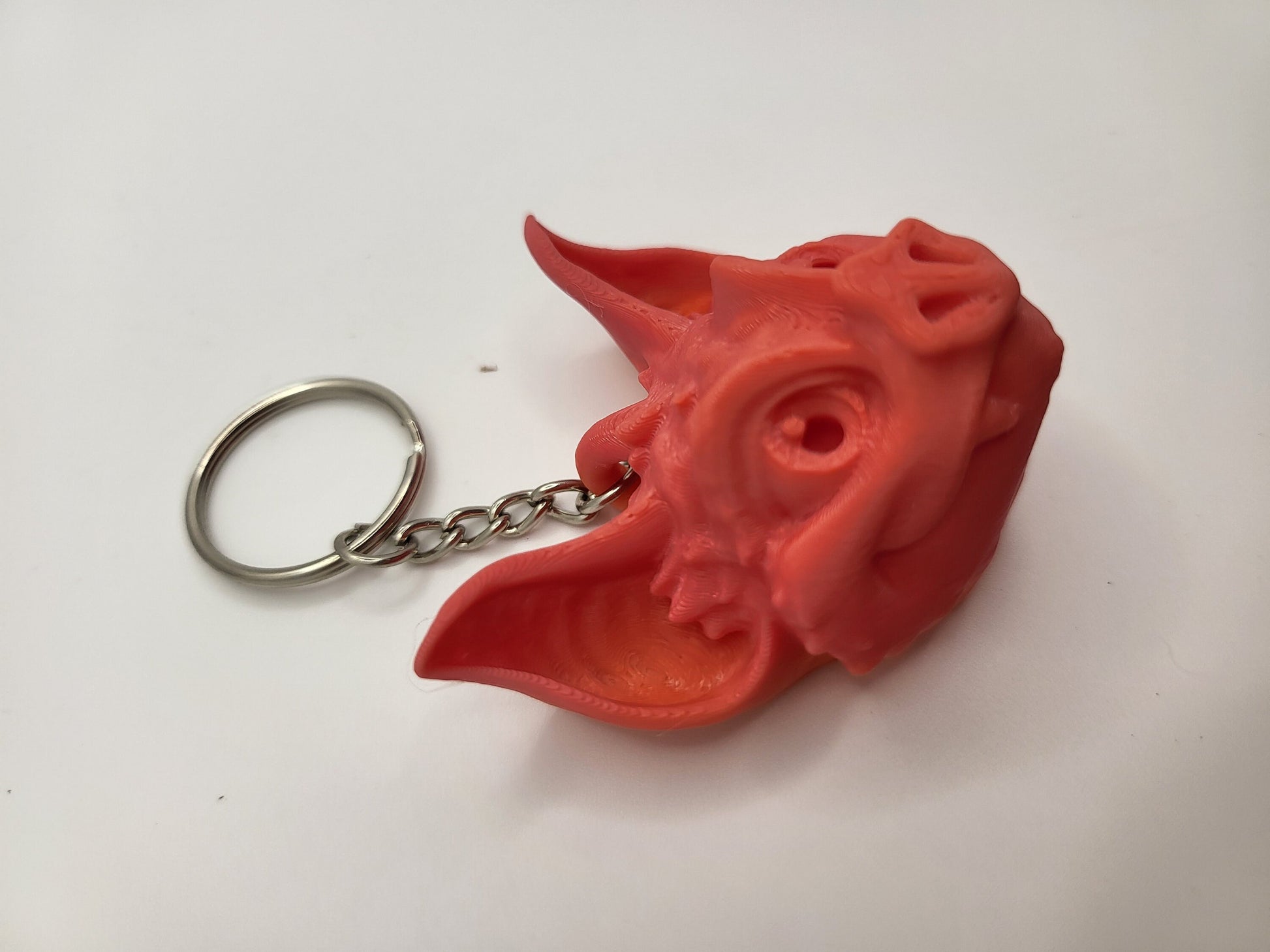 Bat keychain side view showing articulated poseable wings