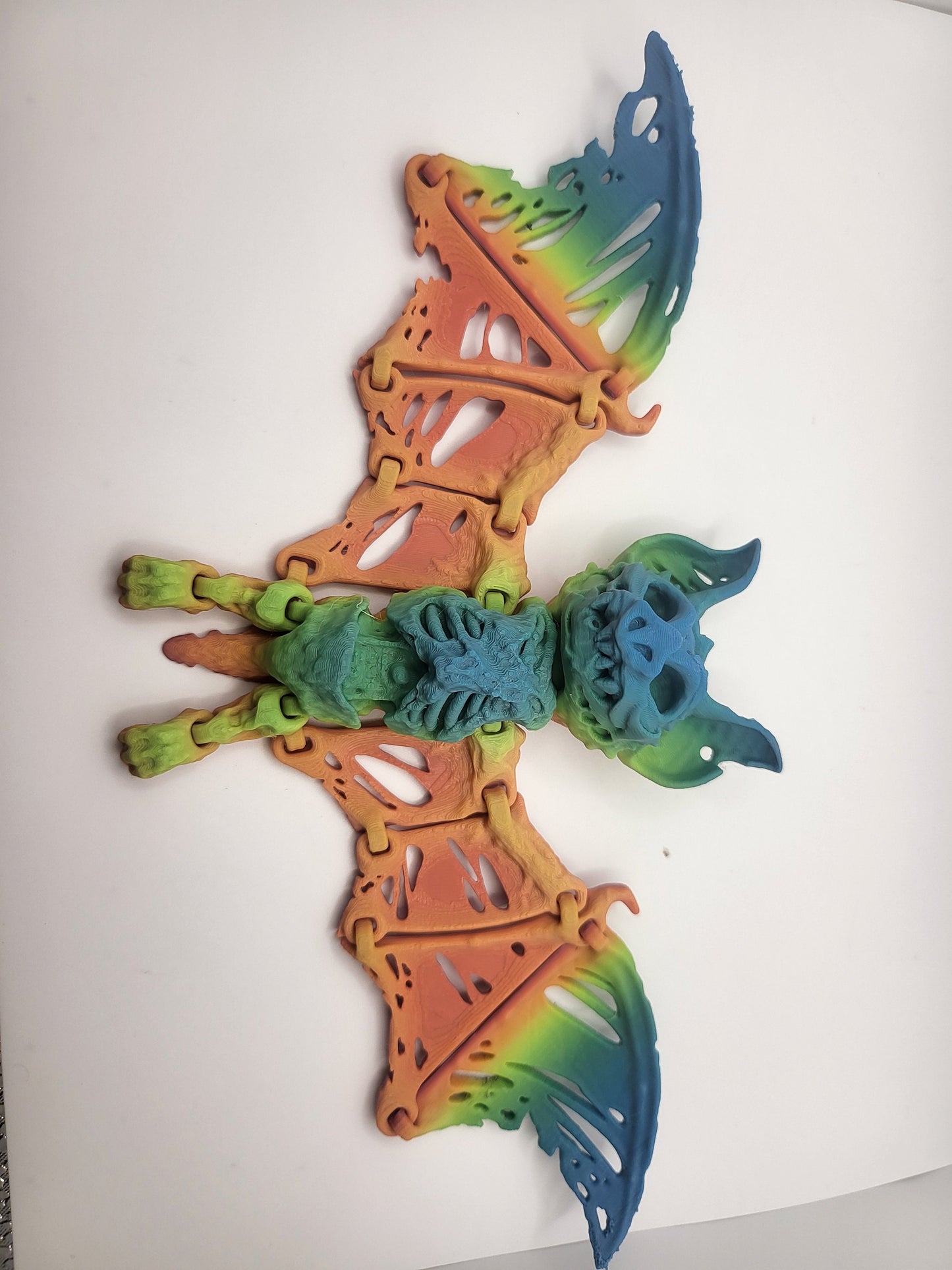 Zombie bat figurine in multiple spooky color options