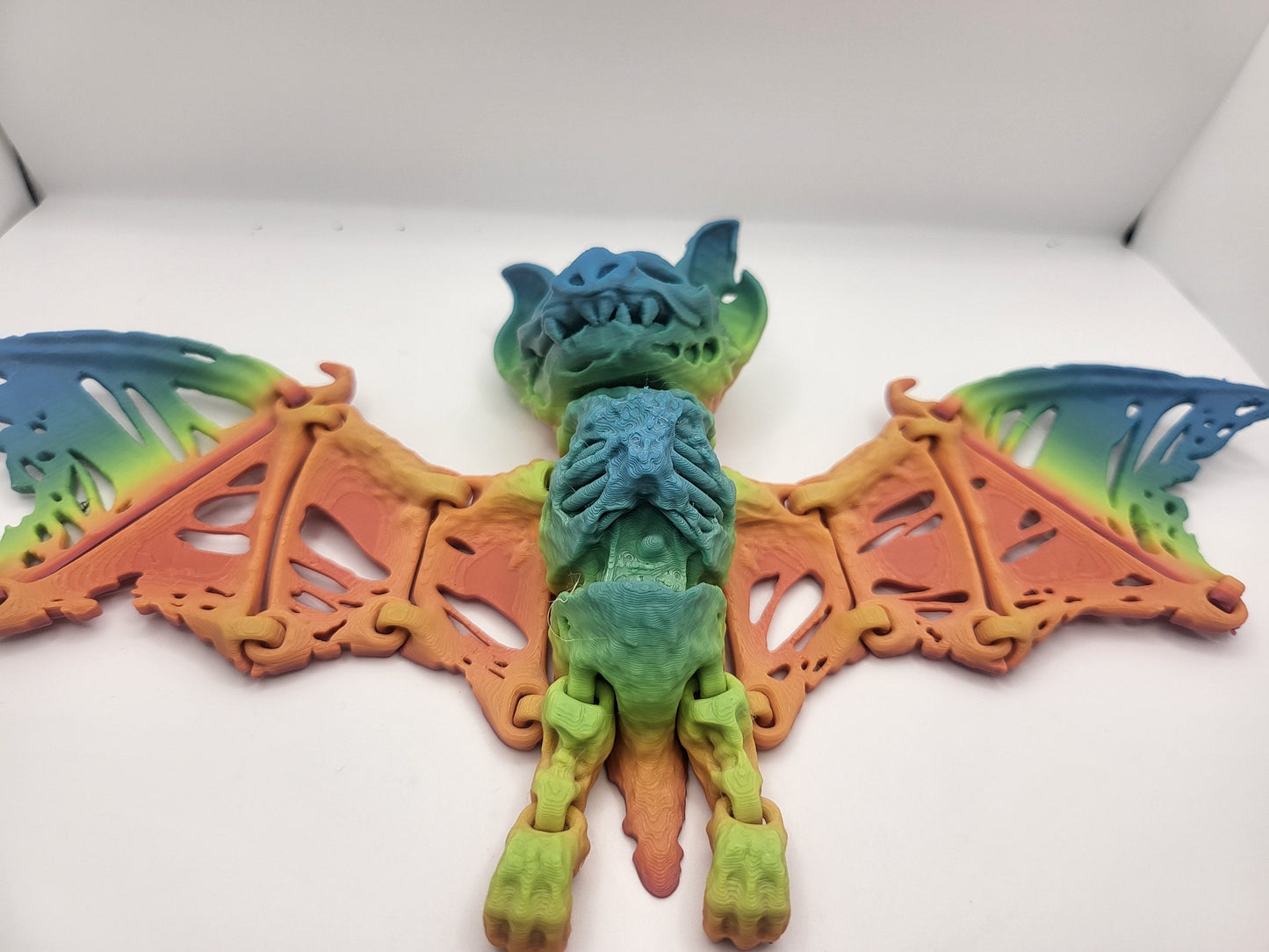 Zombie bat figurine shown from above