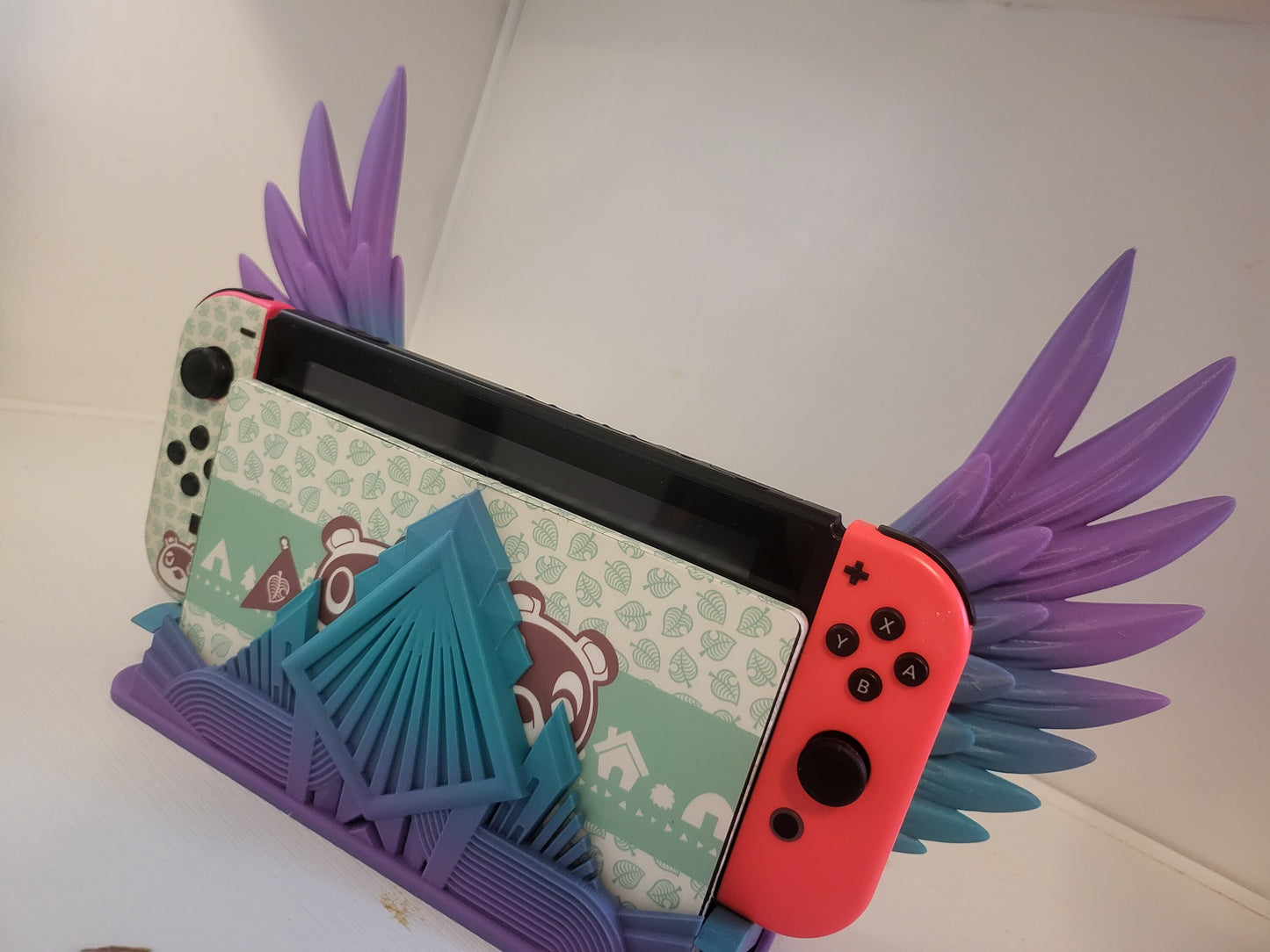 Art Deco Style Articulated Wing Switch Dock 3D Print