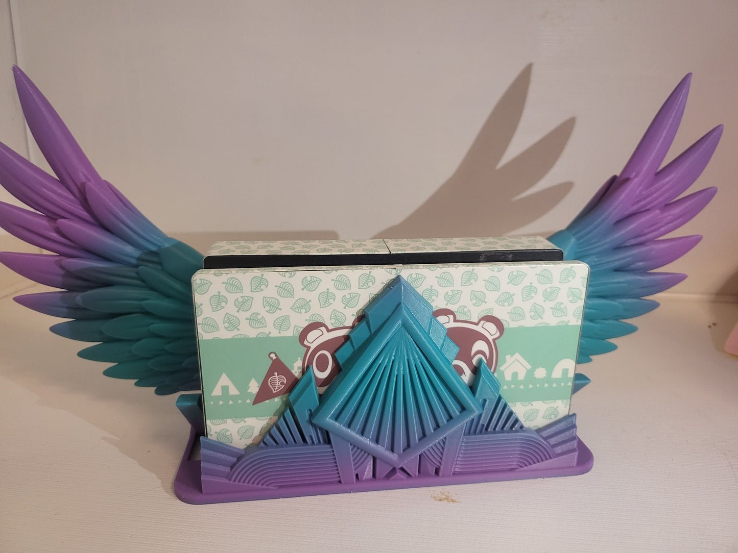 Art Deco Style Articulated Wing Switch Dock 3D Print