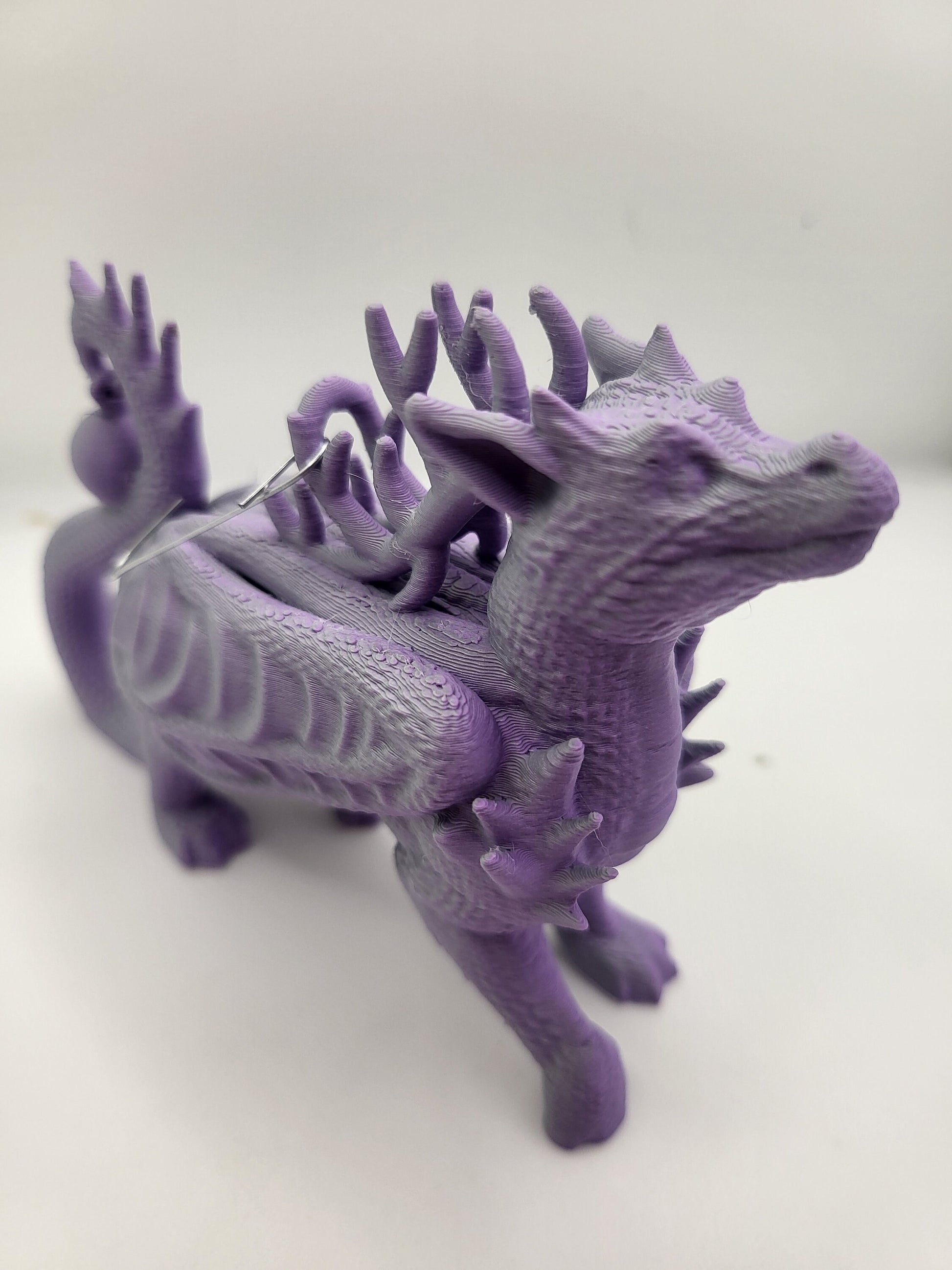 Dragon reindeer ornament in multiple custom Christmas colors