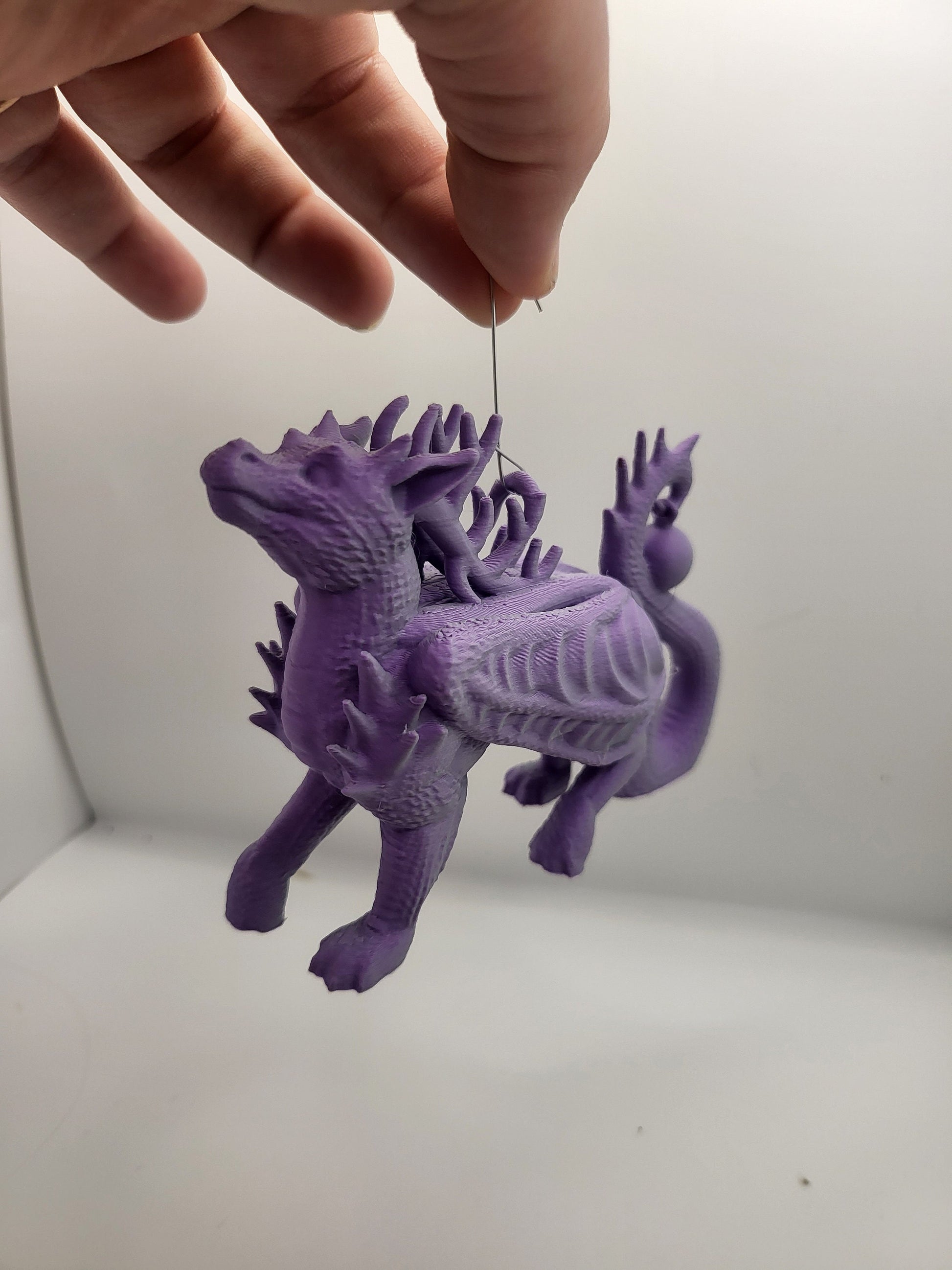 Dragon reindeer Christmas ornament gift packaging