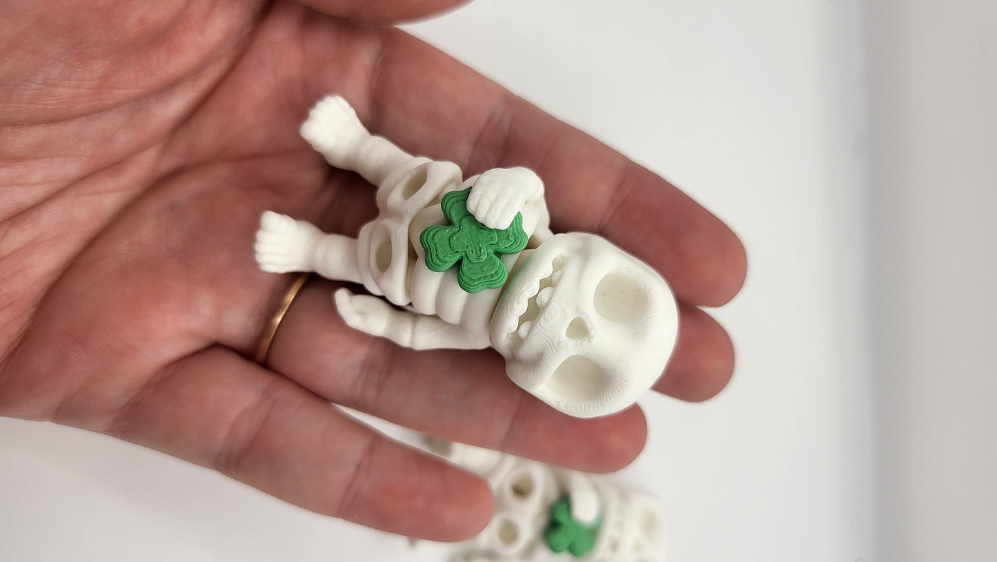 Lucky Tiny Articulated Skeleton with a Four Leaf Clover 3D Print