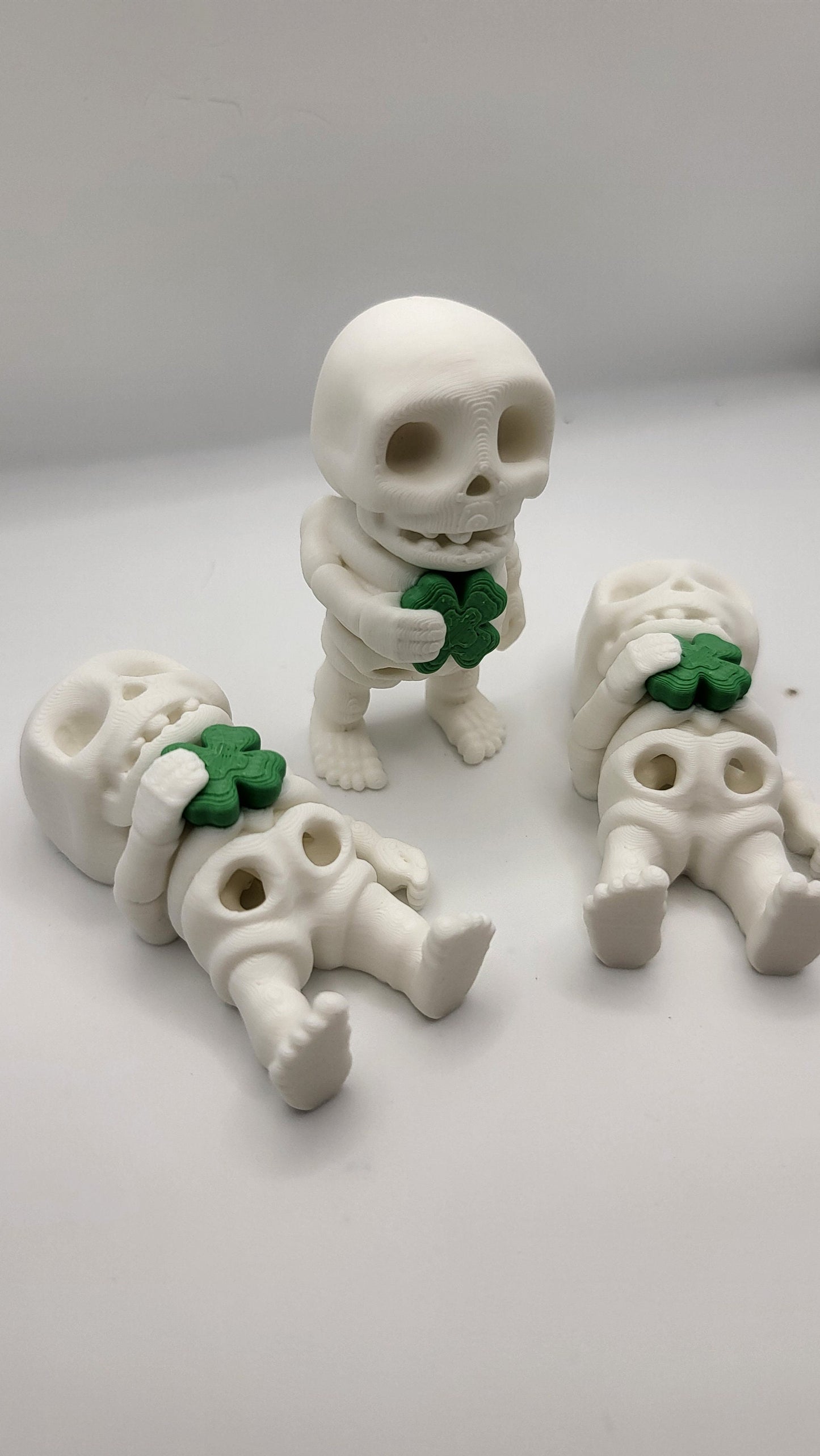 Lucky Tiny Articulated Skeleton with a Four Leaf Clover 3D Print