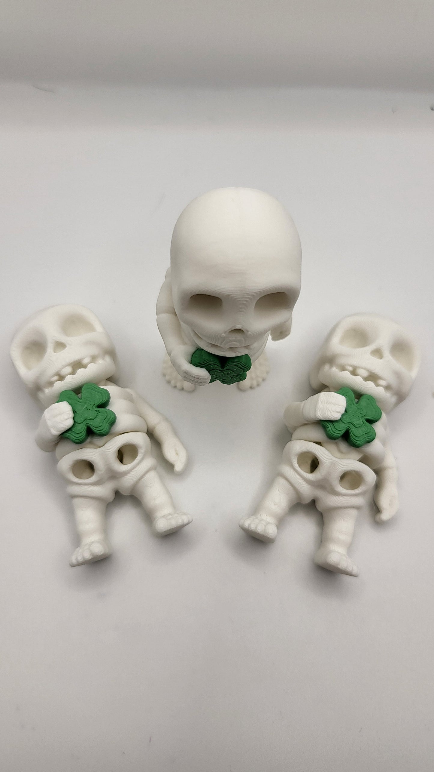 Lucky Tiny Articulated Skeleton with a Four Leaf Clover 3D Print