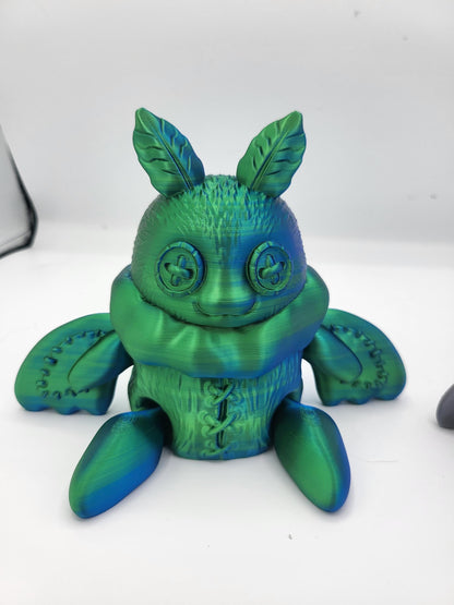 Plushie Mothman alternate angle showing full chunky silhouette