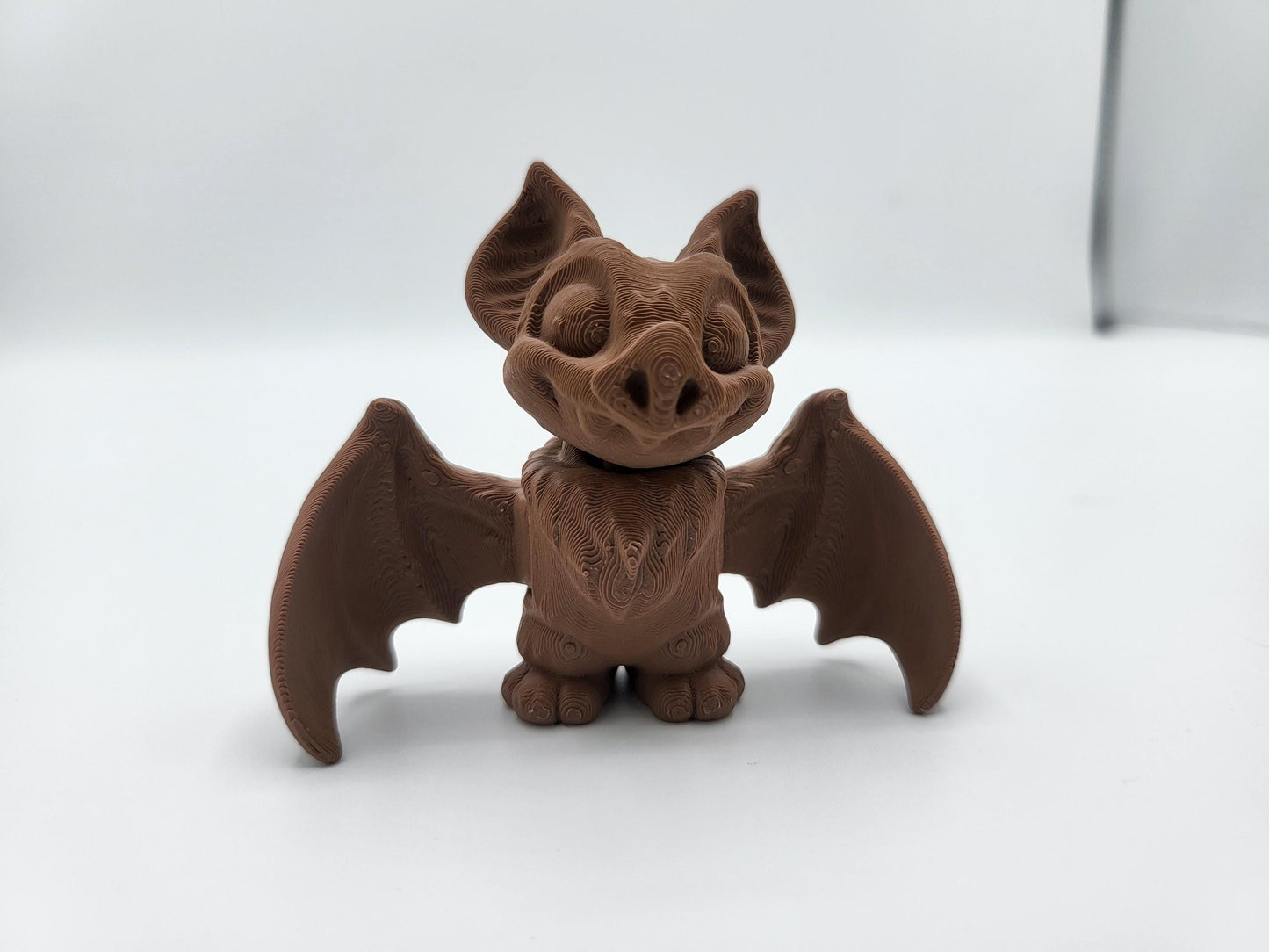Close-up detail of mini bat fidget articulation joints