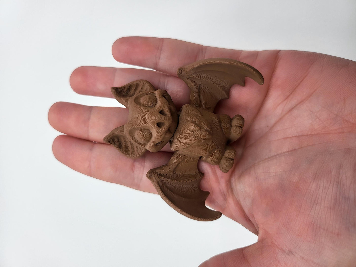 Mini bat keychains shown as a set of multiple colors