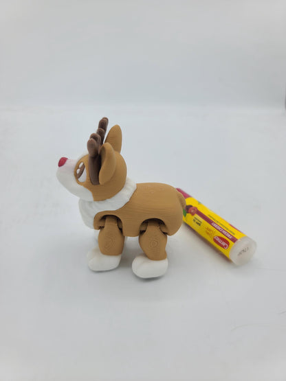 Corgi Rudolph side view showing reindeer antlers and red nose