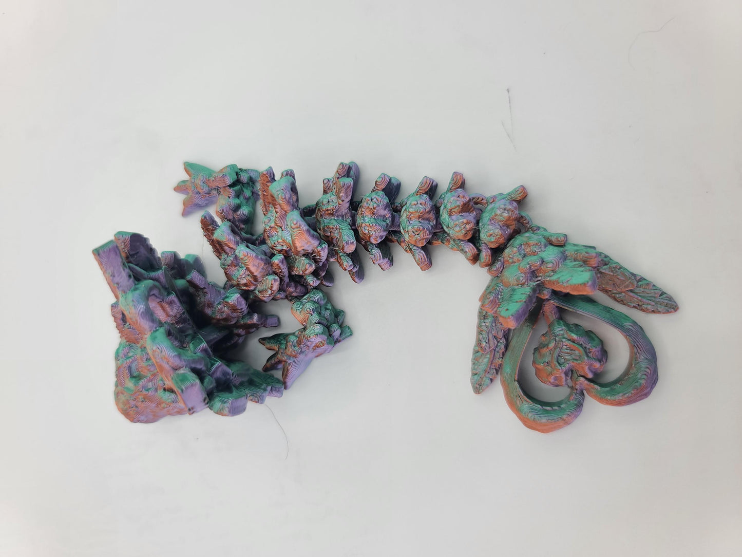 Light Dragon Tadling with Heart Spinner on Tail (optional Keychain) 3D Print