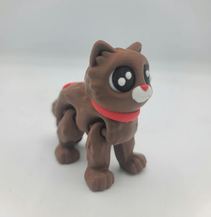Cocoa Kitty in the No Hat style standing alone — chocolate-brown 3D printed flexi cat with red scarf and big dark eyes