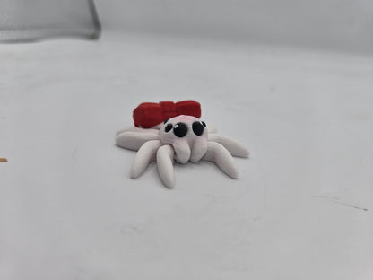 Tiny Cute Articulated Christmas Ribbon Spiders 3D Print