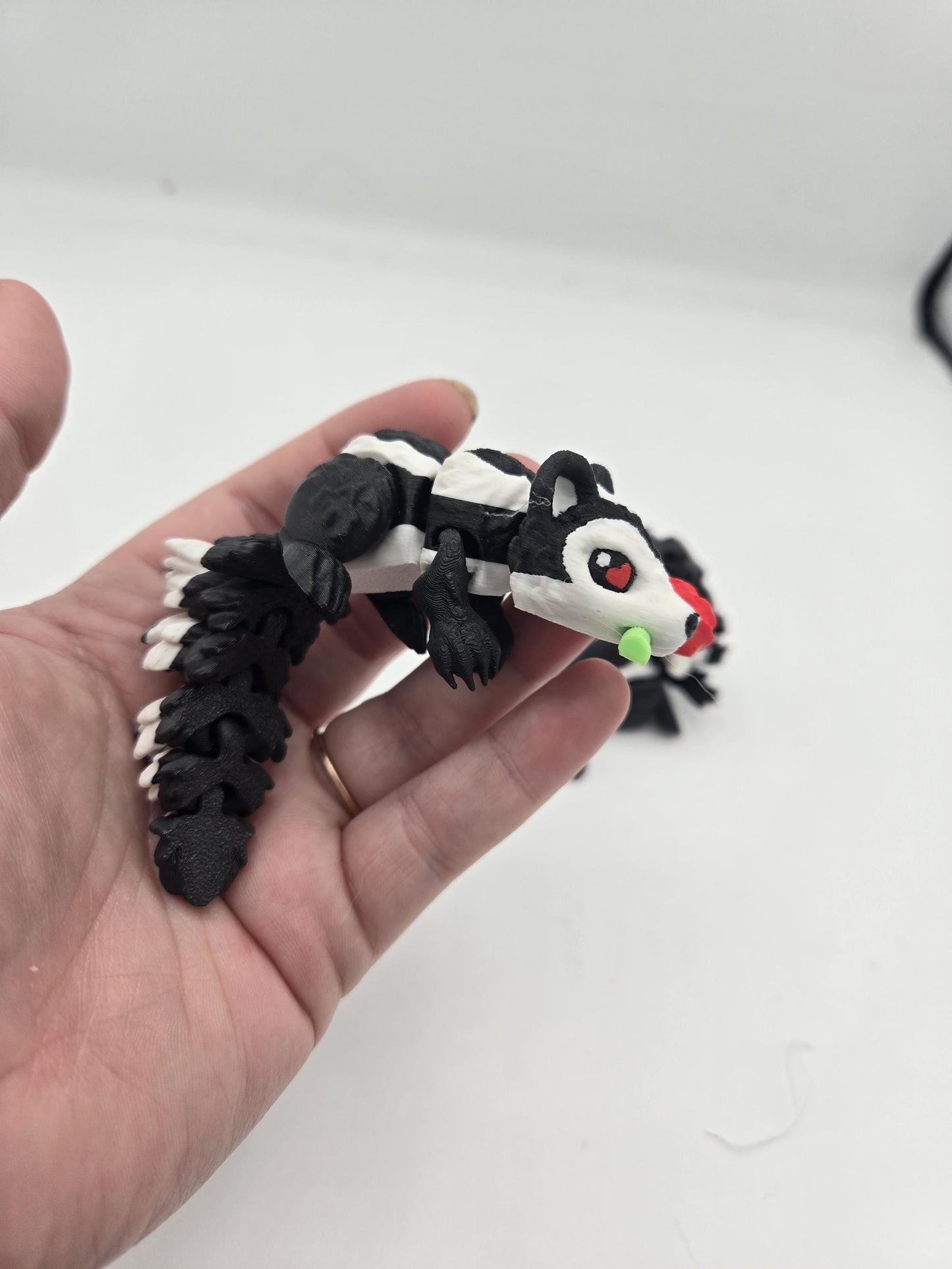 Flexi Cute Heart Eyes Flower Holding Skunk 3D Print