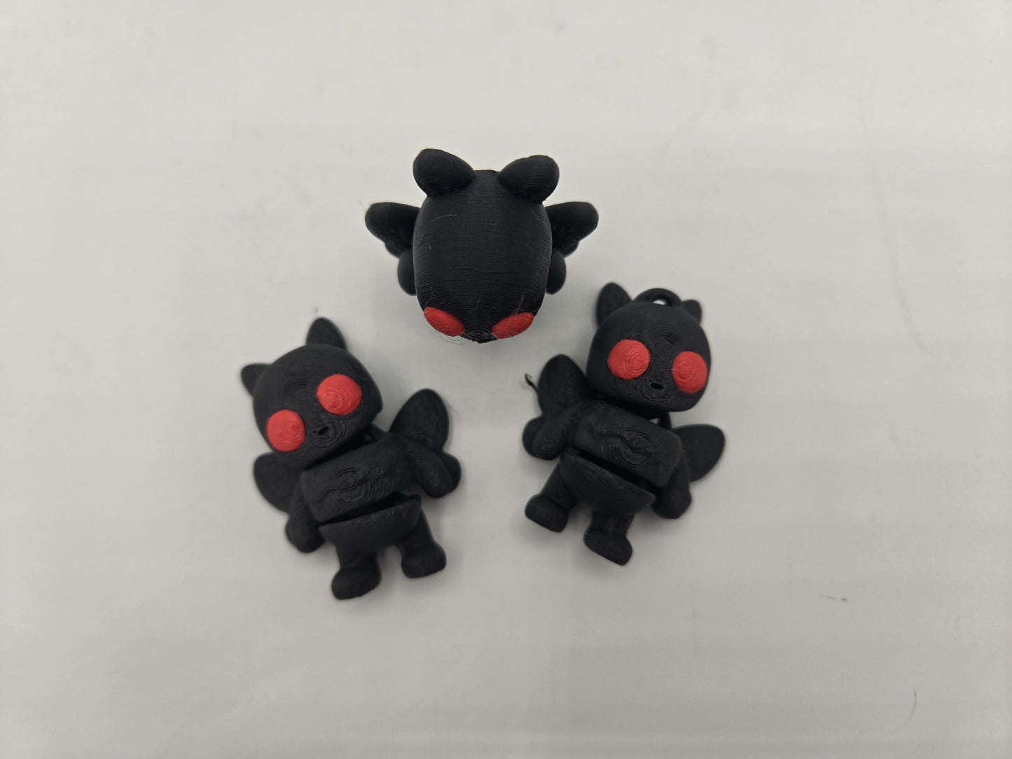 Mini Mothman figurine set — cryptid collector gift