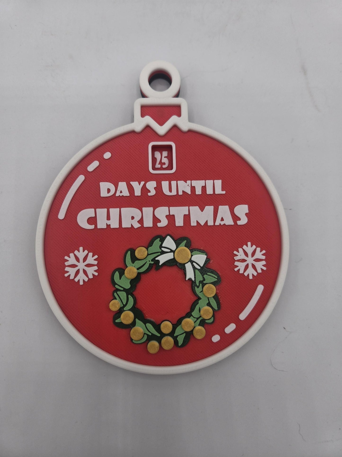 Christmas 25 Day Countdown ornament front view — red 3D printed bauble reading 25 Days Until Christmas with wreath and snowflake details