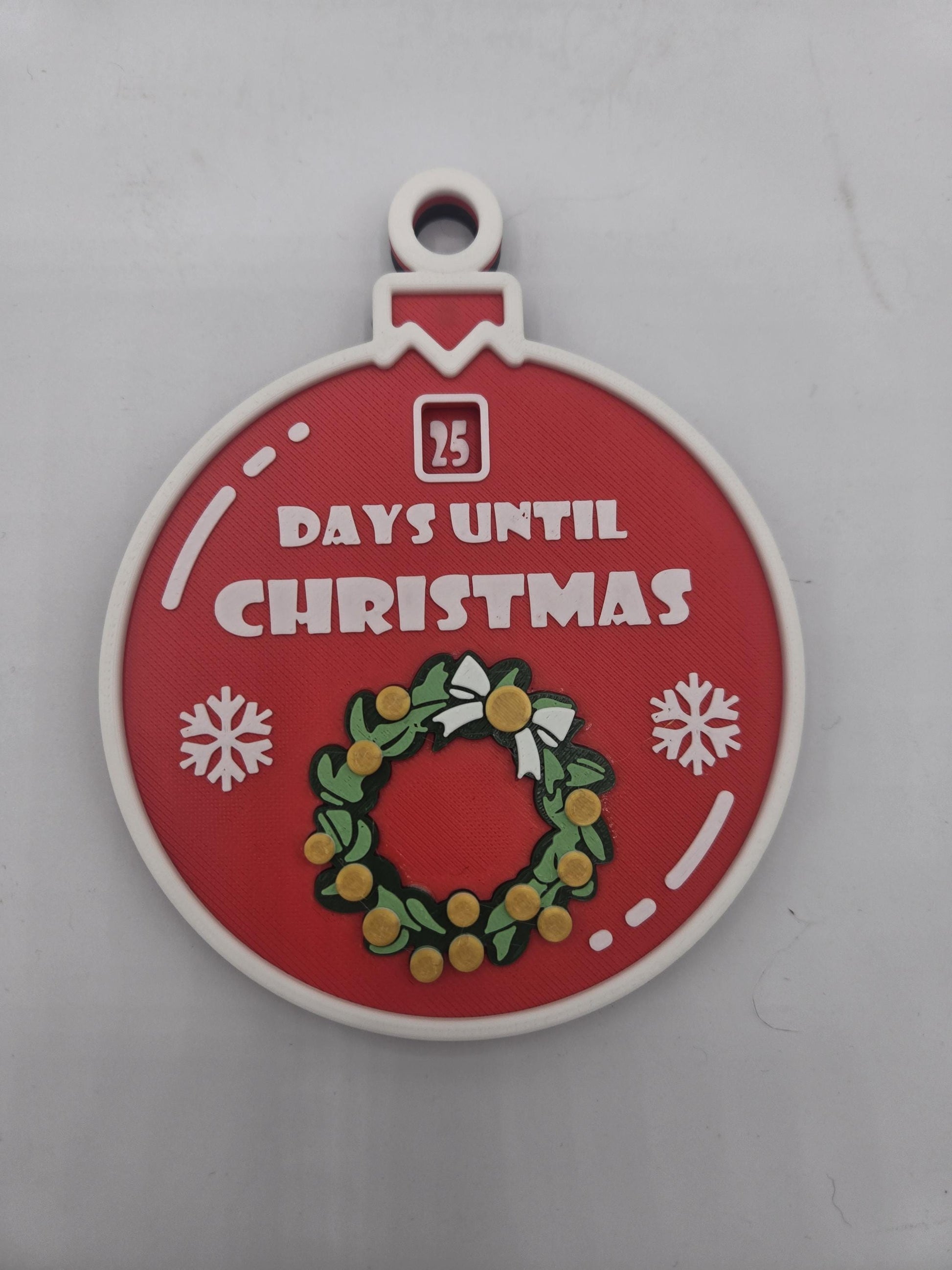 Christmas 25 Day Countdown ornament front view — red 3D printed bauble reading 25 Days Until Christmas with wreath and snowflake details
