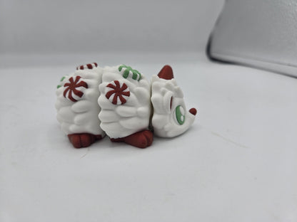 Peppermint Candies Christmas Hedgehog flexi, side view — articulated 3D printed segments decorated with red and green peppermint swirls