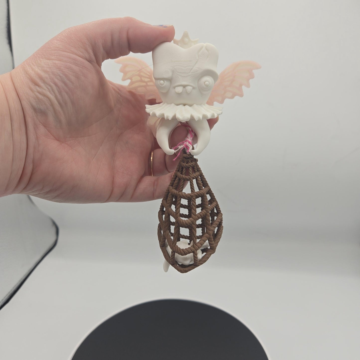 Tooth Fairy with Bag of Teeth Spooky Fun Display 3D print shown on a desk or display surface