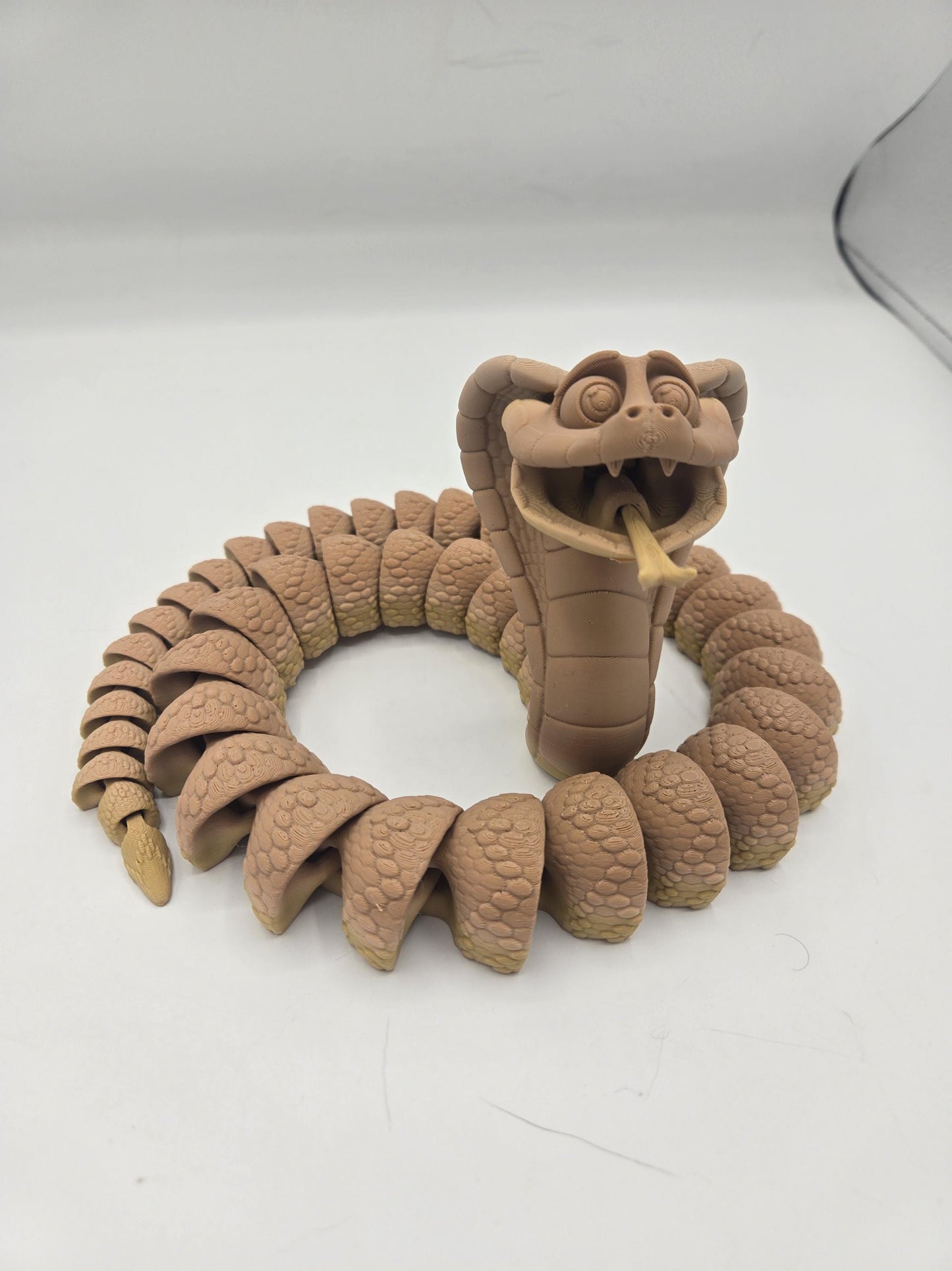King Cobra Flexi Articulated Snake 3D print shown on a desk or display surface