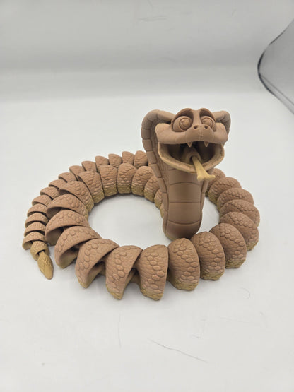 King Cobra Flexi Articulated Snake 3D print shown on a desk or display surface