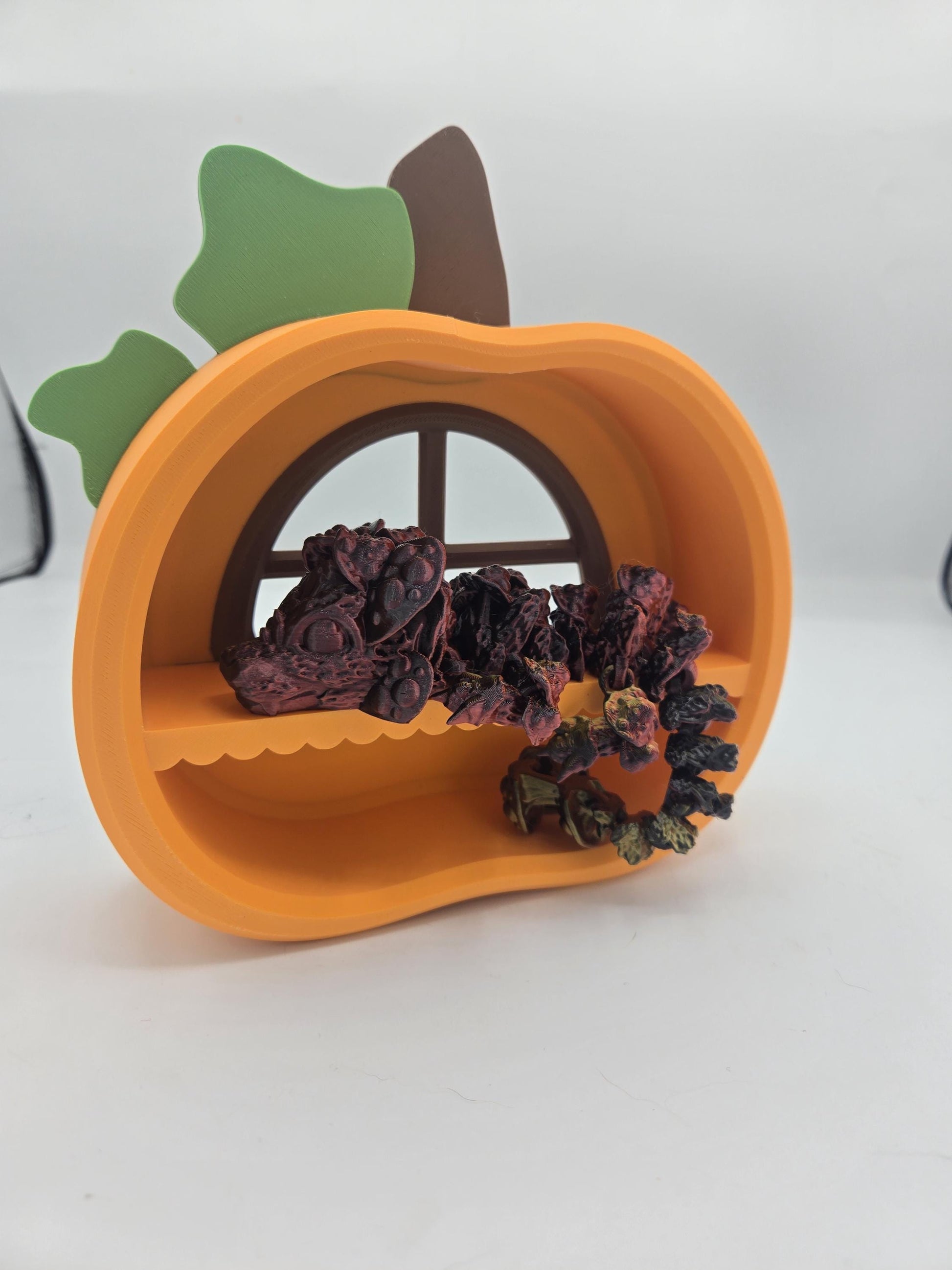 Pumpkin Trinket Shelf styled with small dragon flexis and a mushroom wreath, showing how mini collectibles fit on the shelf — 3D printed