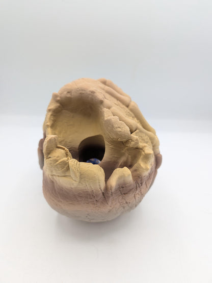 Back of the skull dice tower showing the dice drop opening at the top of the skull