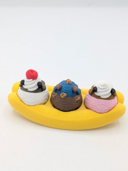 Single dragon banana split from behind — chocolate, vanilla, and strawberry scoops with cherry and whipped cream