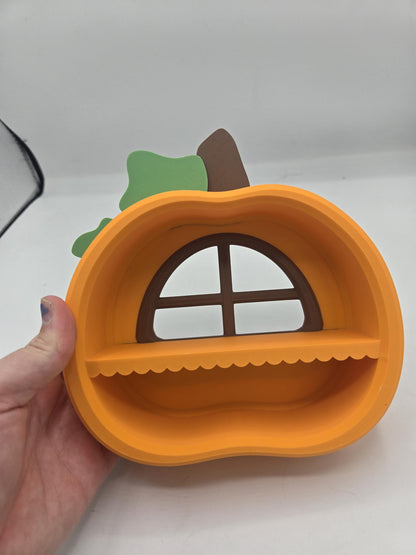 Pumpkin Trinket Shelf held in a hand for scale, showing the compact size of the 3D printed fall display shelf