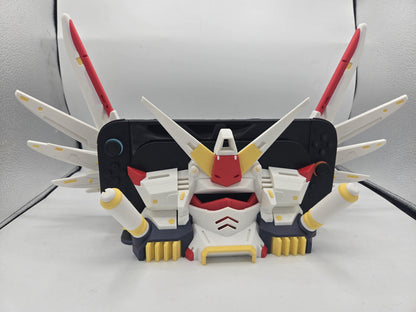 Mechdam Nintendo Switch 2 Dock Display, 3D printed — white, red, and yellow mecha head with raised wing array framing the docked console
