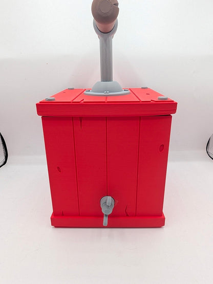 Back view of red TNT detonator birdhouse showing plank detailing and rear fastener, 3D printed