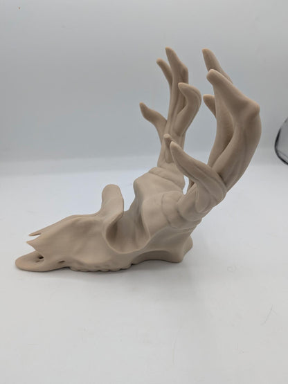 Side view of the deer skull jewelry stand showing the sculpted antler tines