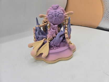 Spooky Mermaid Doll 3D print in pastel filament displayed on its wavy base, alternate angle showing fins and tentacle arms