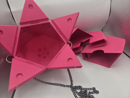 D20 Dice Shaped Purse 3D print in pink opened with its panels fanned out, the separate pink organizer insert pieces and black chain strap beside it