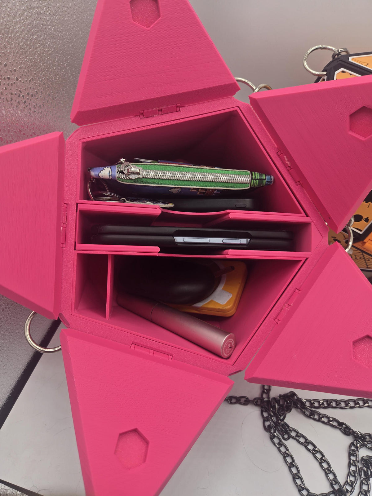 D20 Dice Shaped Purse 3D print opened to show the modular organizer insert holding a wallet, phone, lipstick and keys in separate slots
