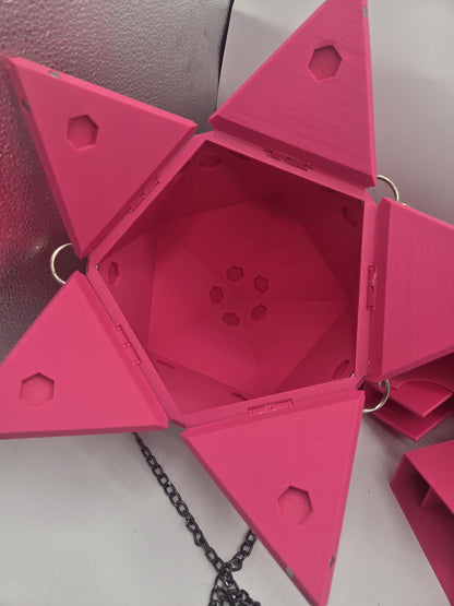 D20 Dice Shaped Purse 3D print in pink opened flat from above, empty hexagonal interior with hinged triangular panels and silver chain rings