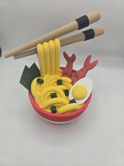 Ramen Bowl Display and Stash 3D print top-down view of the noodles, shrimp, egg and seaweed in the red striped bowl with chopsticks resting on top