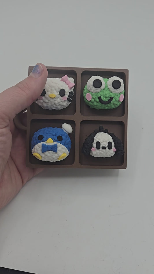 Video of the Sanrio themed rice ball tray clicker fidget — pressing the kawaii rice ball characters to sound their mechanical key switches, 3D printed